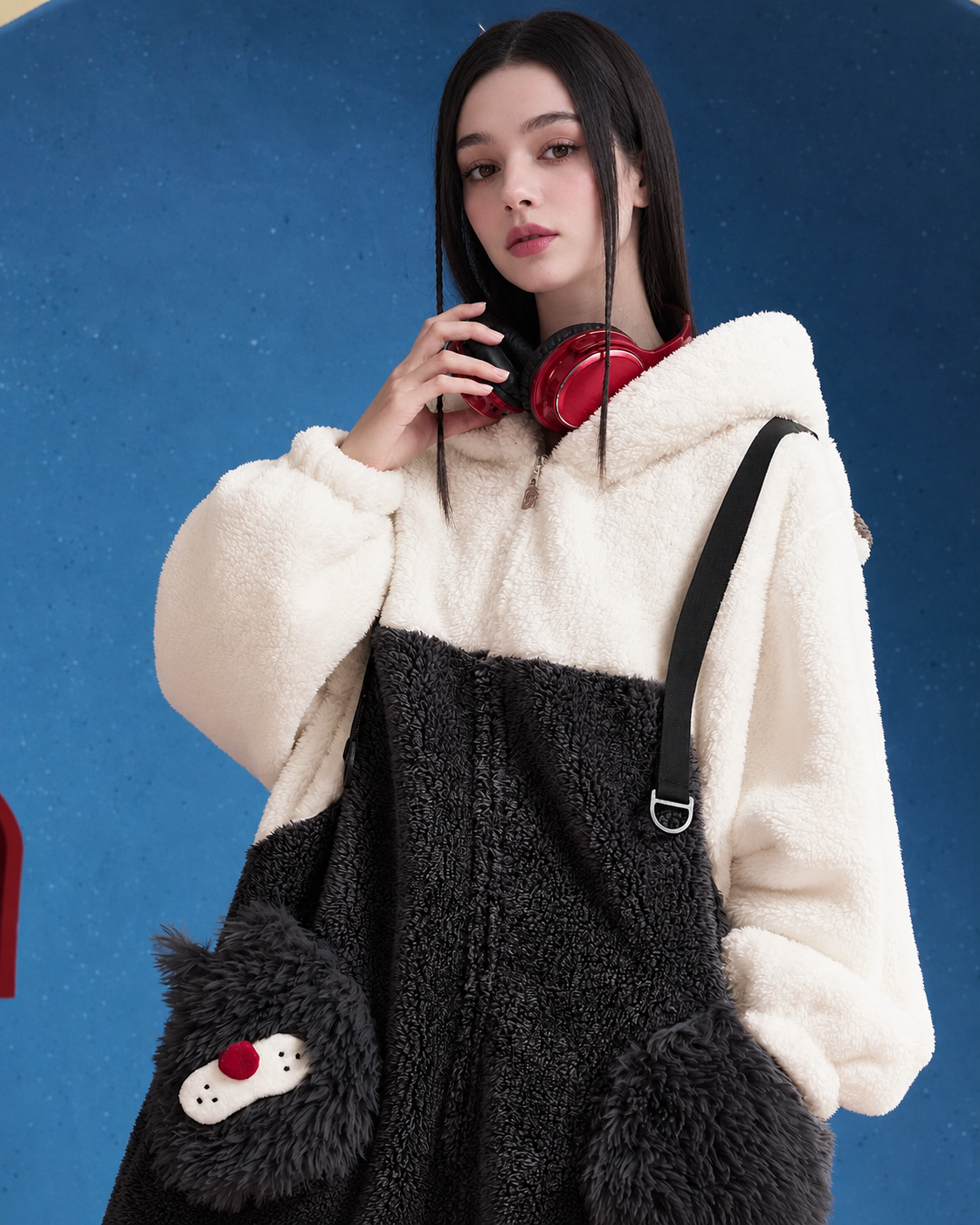 Front close view of fleece texture, zipper and cat-face pockets
