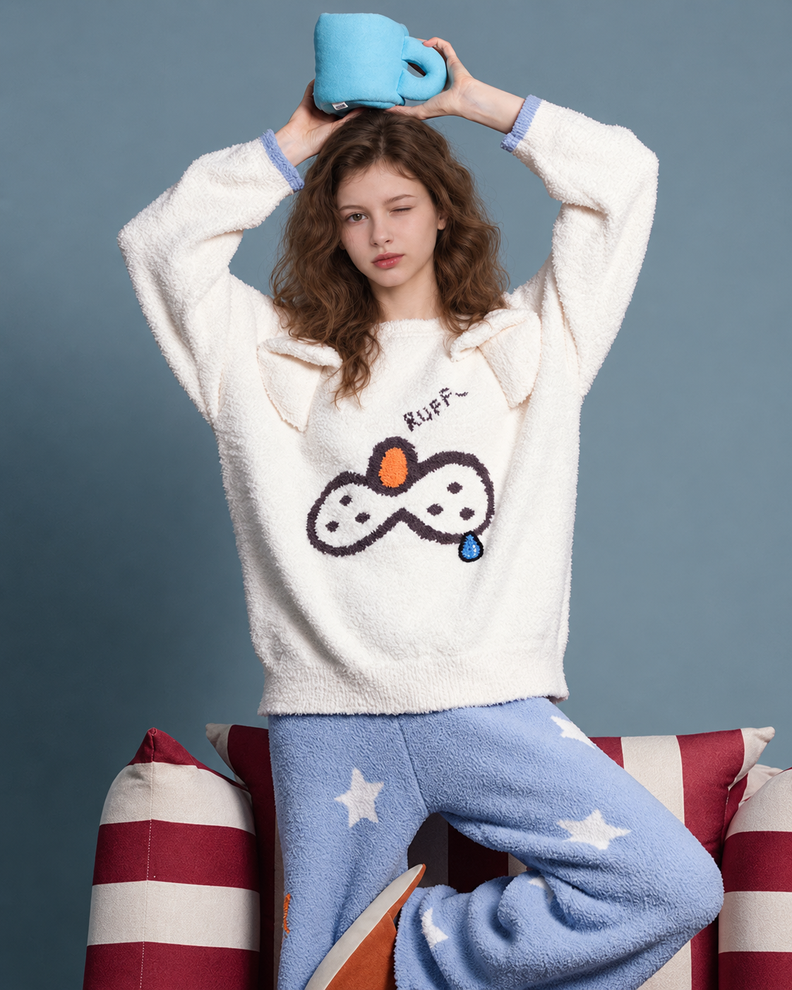Cat & Star Plush Pajama Set – raised arms showing the long-sleeved ivory top - Roomden