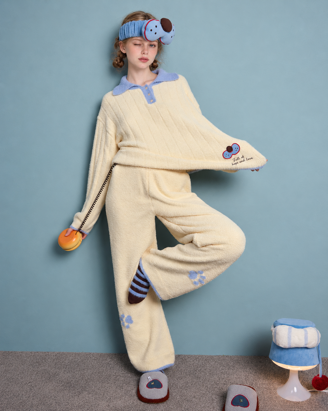 Plush Paw Print Pajama Set – cream yellow and blue standing view with a lifted leg - Roomden