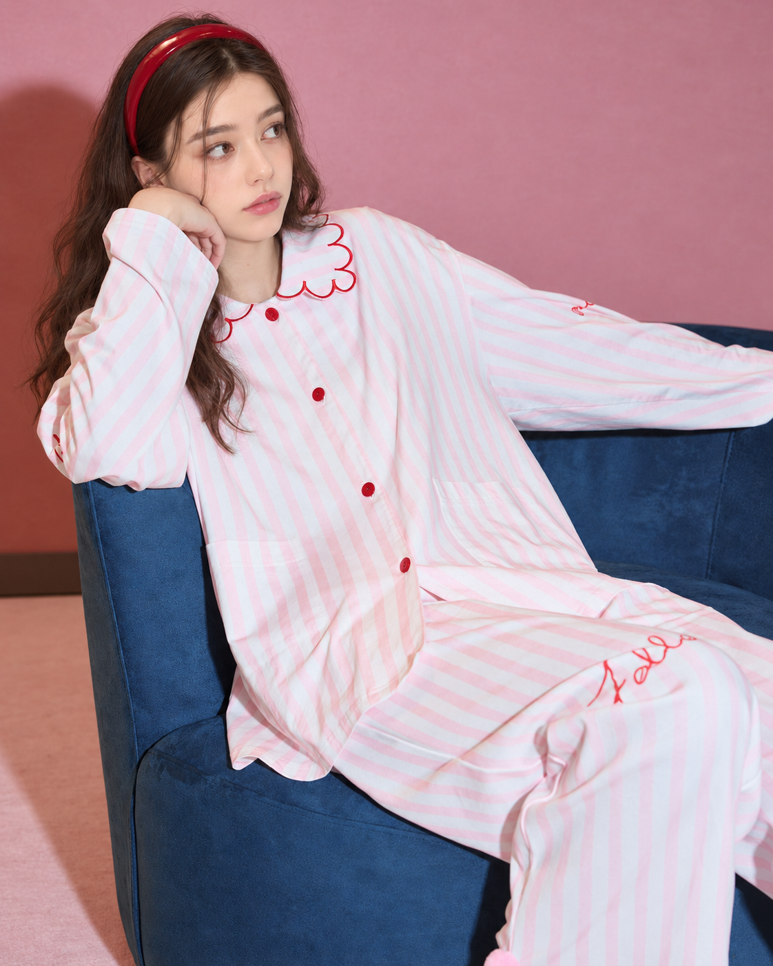 Scalloped Stripe Cotton Pajama Set – leaning on a blue chair showing the scalloped collar - Roomden