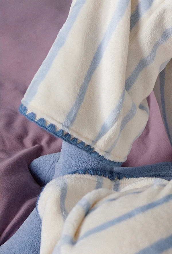Striped Fleece Pajama Set – close-up of blue edging on cuffs and pant hems - Roomden