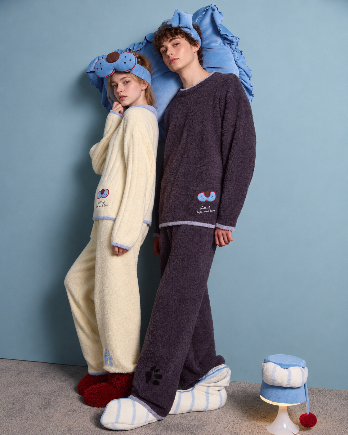 Plush Paw Print Pajama Set – cream yellow and blue standing scene leaning against a blue cushion - Roomden