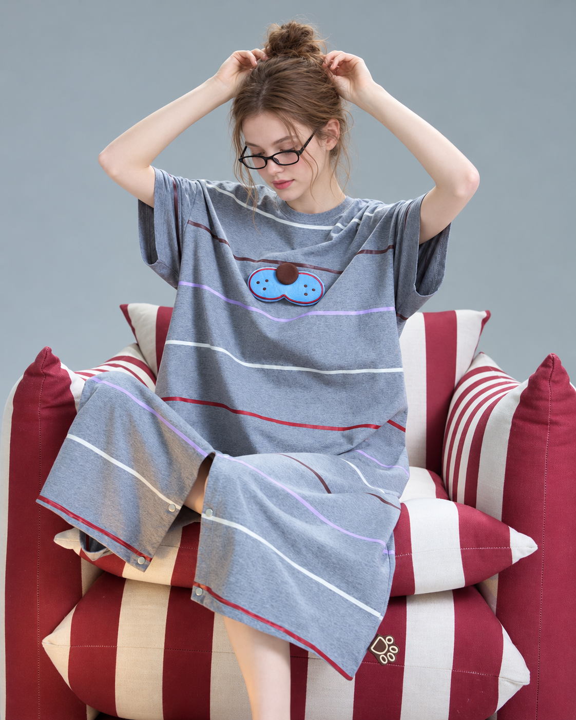 Cat striped one-piece pajamas – Seated chair view - Roomden