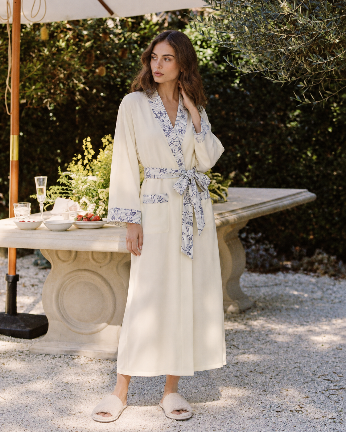 Apricot-cream Inkshore robe with blue botanical trim — garden view 1