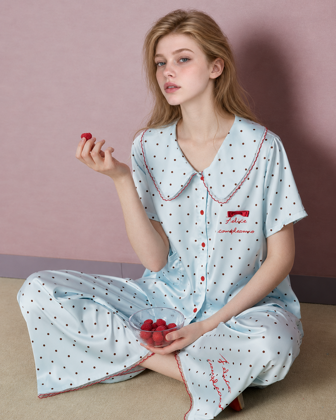 Polka Dot Pajama Set – Pale blue cross-legged seated view with embroidered lettering - Roomden