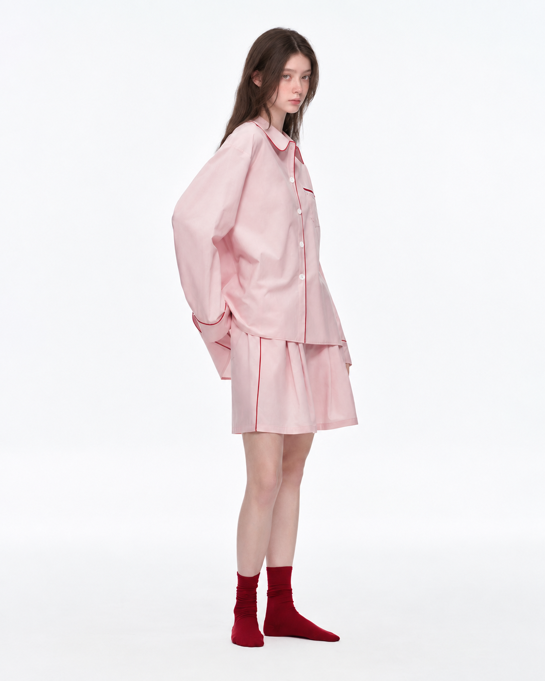 Linehaven contrast-piped pajama shorts set in pink, side view - Roomden