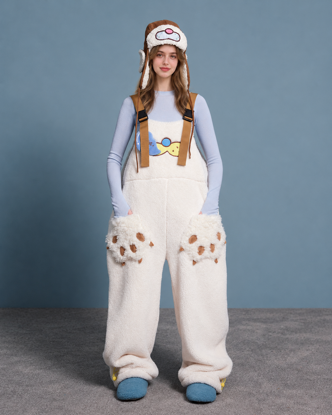 Cat-paw plush one-piece pajamas – cream front standing view with paw pockets - Roomden