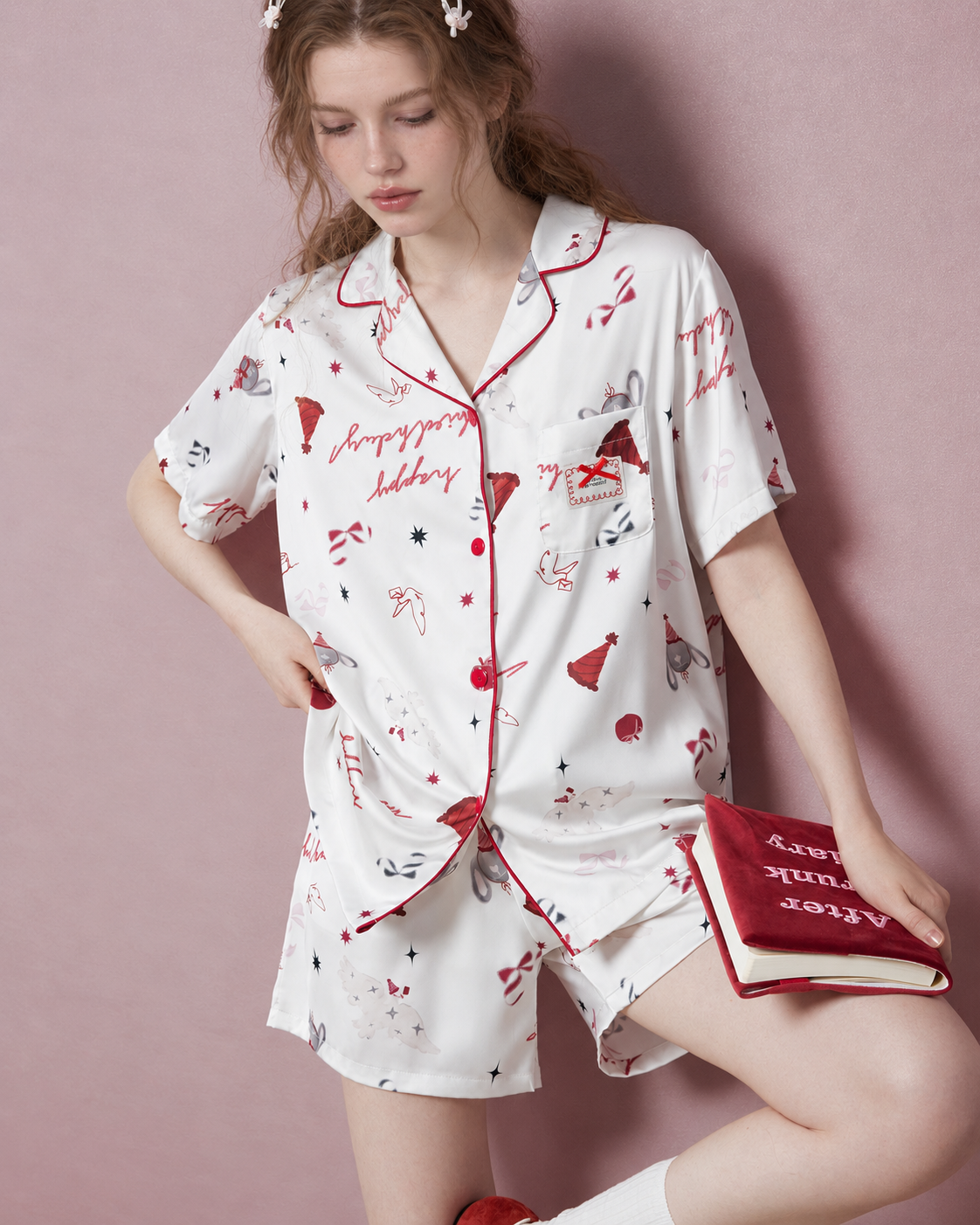 Gift Print Satin Short Pajama Set – white and red print, bent-knee pose with book - Roomden
