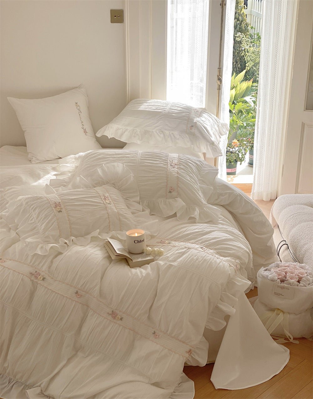 Winnifred Ruffled Washed Cotton Bedding Set – white gathered bedding beside a bright window - Roomden