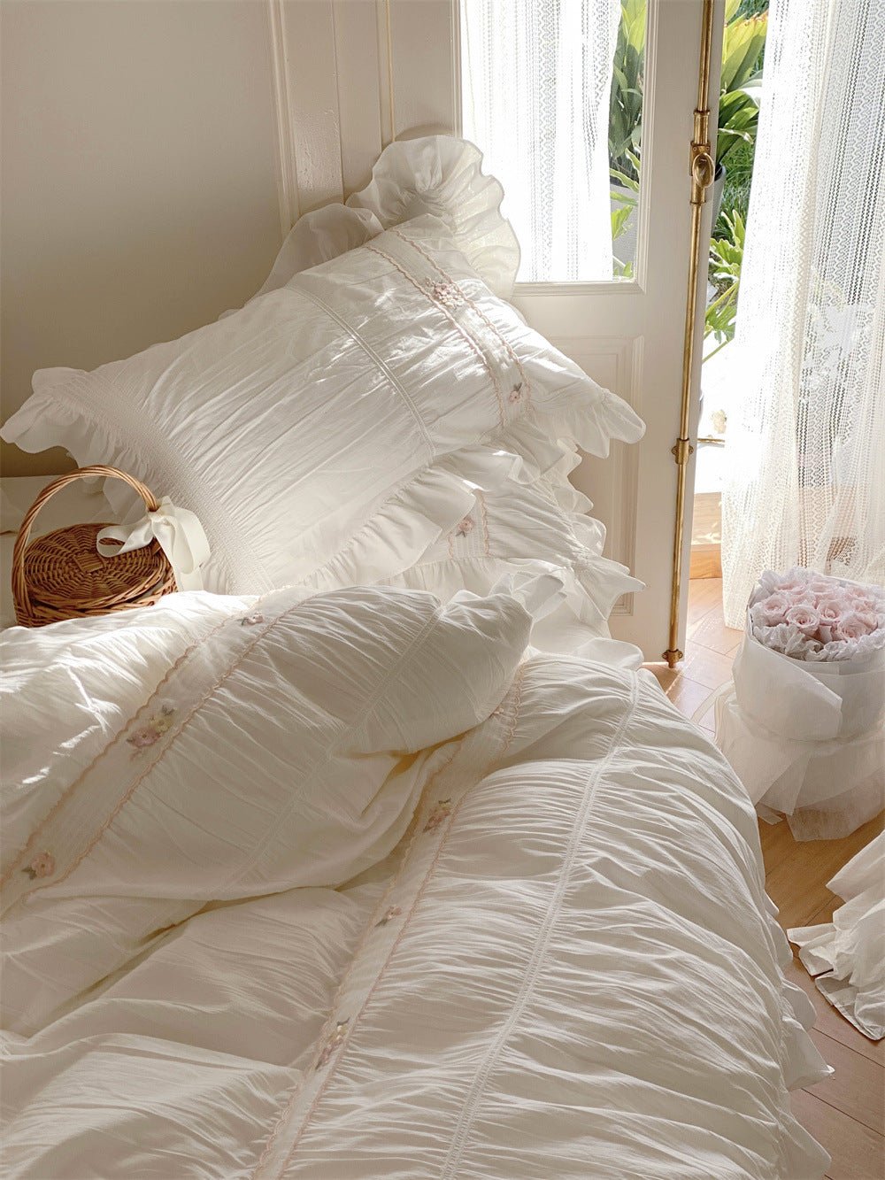 Winnifred Ruffled Washed Cotton Bedding Set – white embroidered pillow beside the window - Roomden