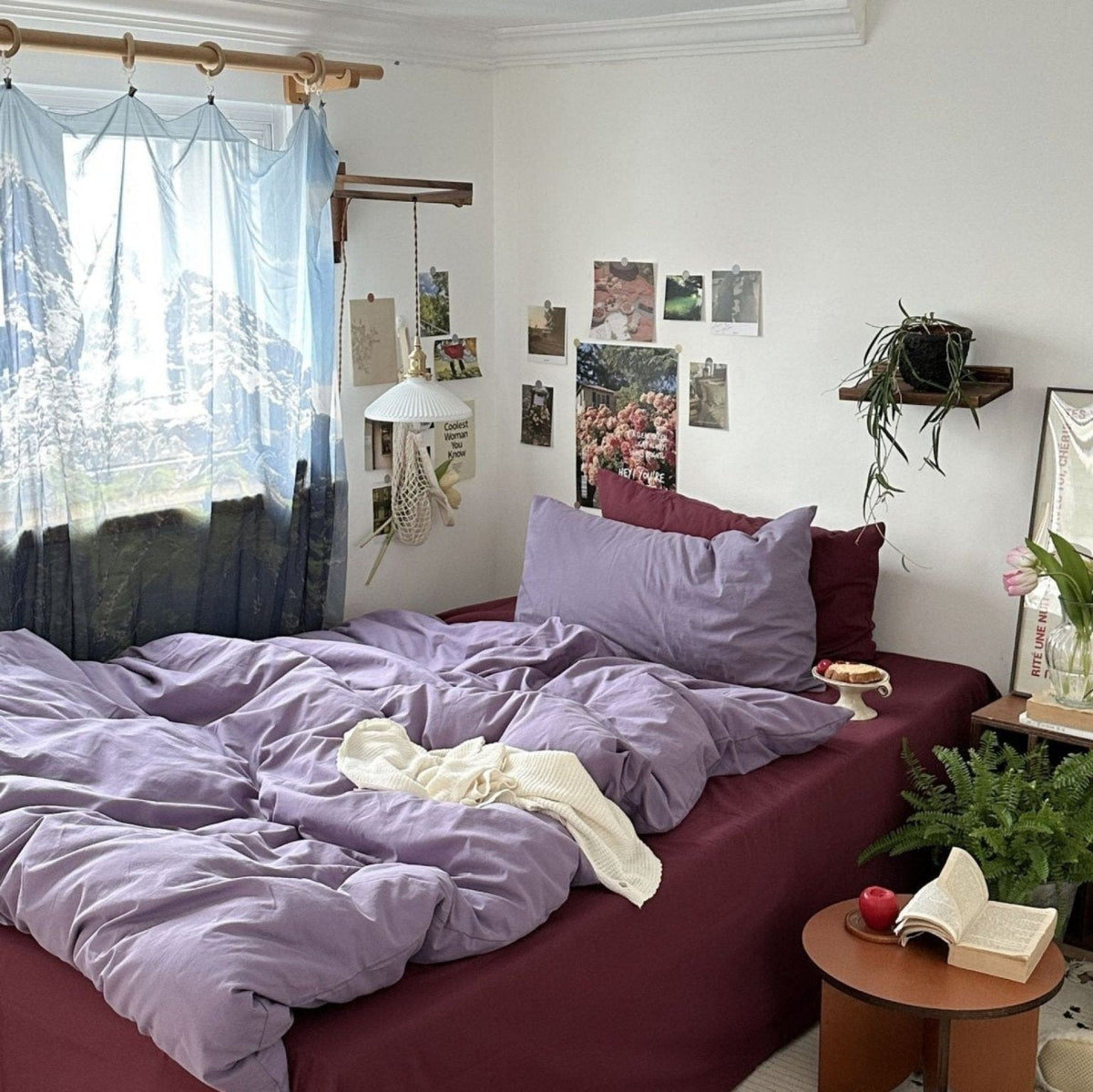Thistle Plum Cotton Bedding Set – full lilac and plum bedding beside a window - Roomden