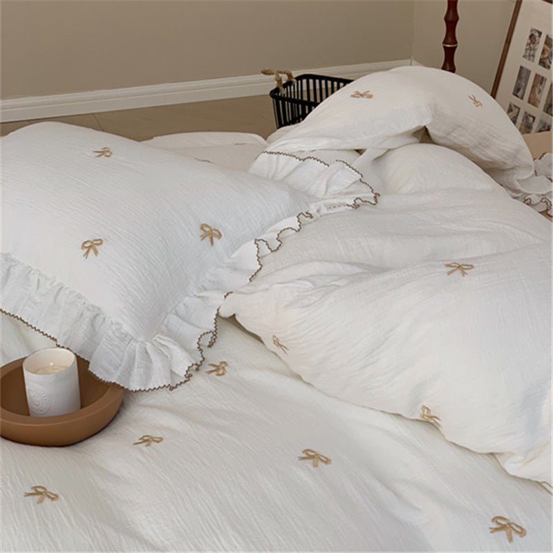 Fenlaire Bow Embroidered Double Gauze Bedding Set – Ivory Bow embroidered bow bedding with ruffled edges - Roomden