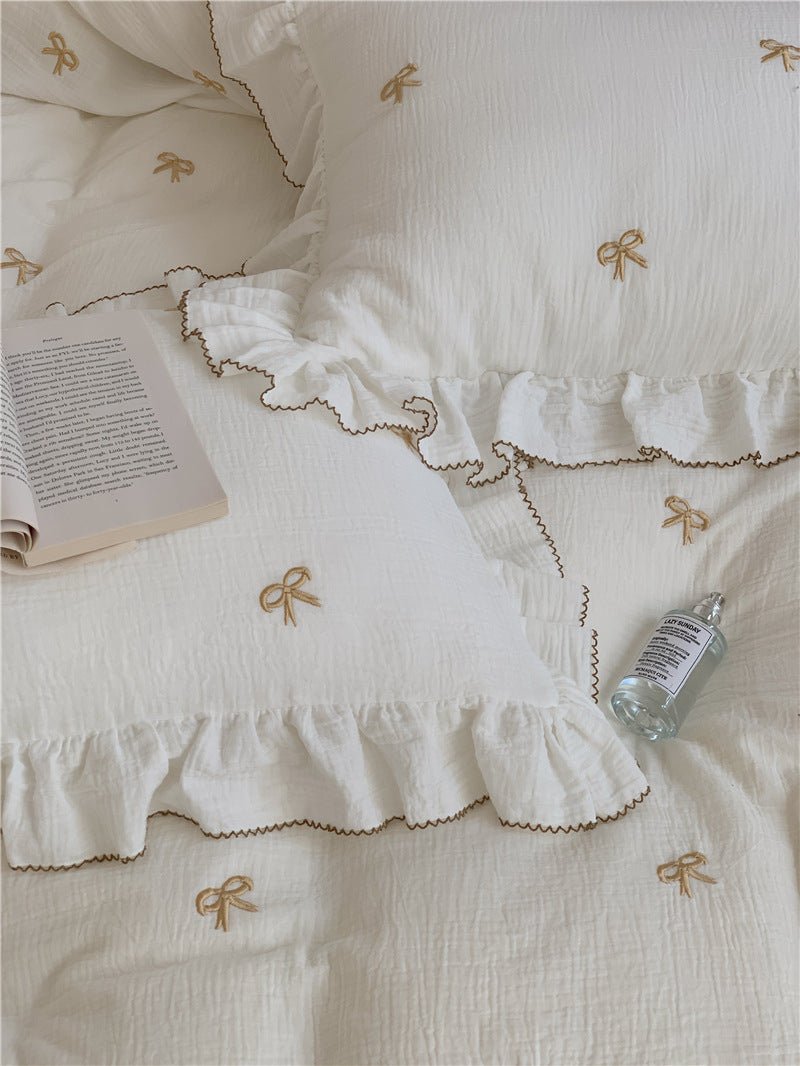 Fenlaire Bow Embroidered Double Gauze Bedding Set – Ivory Bow embroidered bow bedding with ruffled edges - Roomden