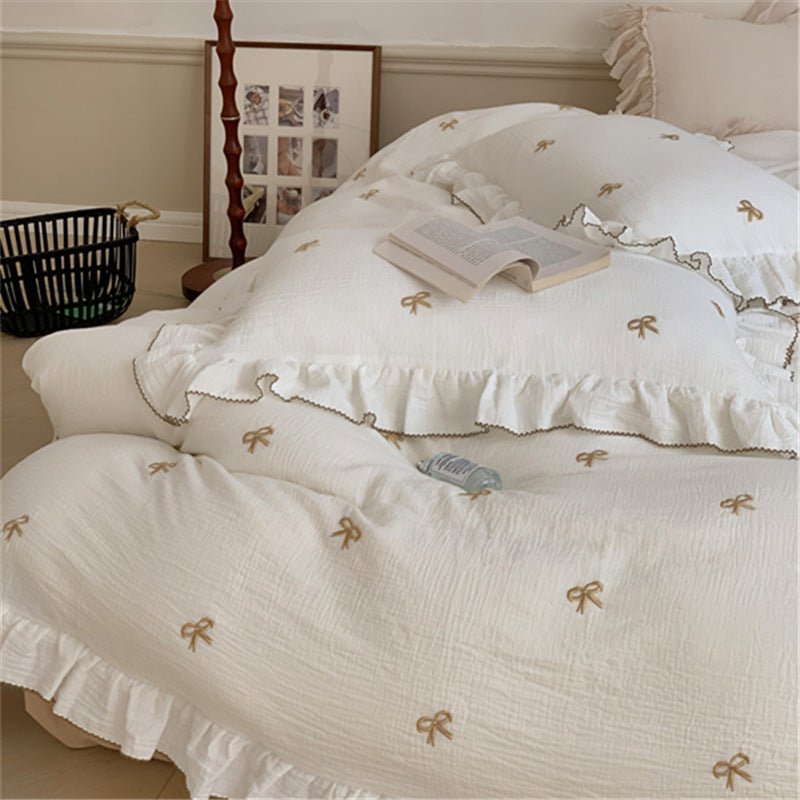 Fenlaire Bow Embroidered Double Gauze Bedding Set – Ivory Bow embroidered bow bedding with ruffled edges - Roomden