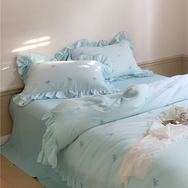 Fenlaire Bow Embroidered Double Gauze Bedding Set – Powder Blue embroidered bow bedding with ruffled edges - Roomden