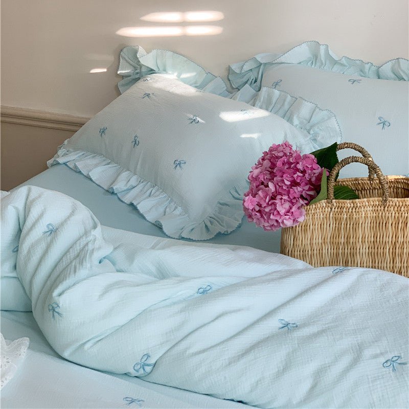 Fenlaire Bow Embroidered Double Gauze Bedding Set – Powder Blue embroidered bow bedding with ruffled edges - Roomden