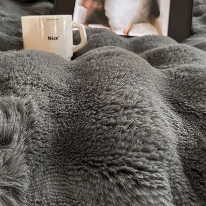Close-up of gray faux fur texture showing soft fluffy surface – RoomDen
