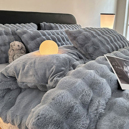 Grey blue plush faux fur bedding set styled with soft lighting – RoomDen