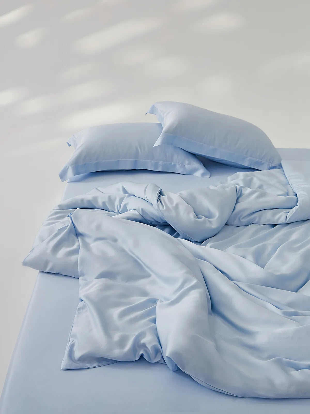 Silky cooling Tencel duvet cover set with a soft minimalist look and smooth draped texture – RoomDen