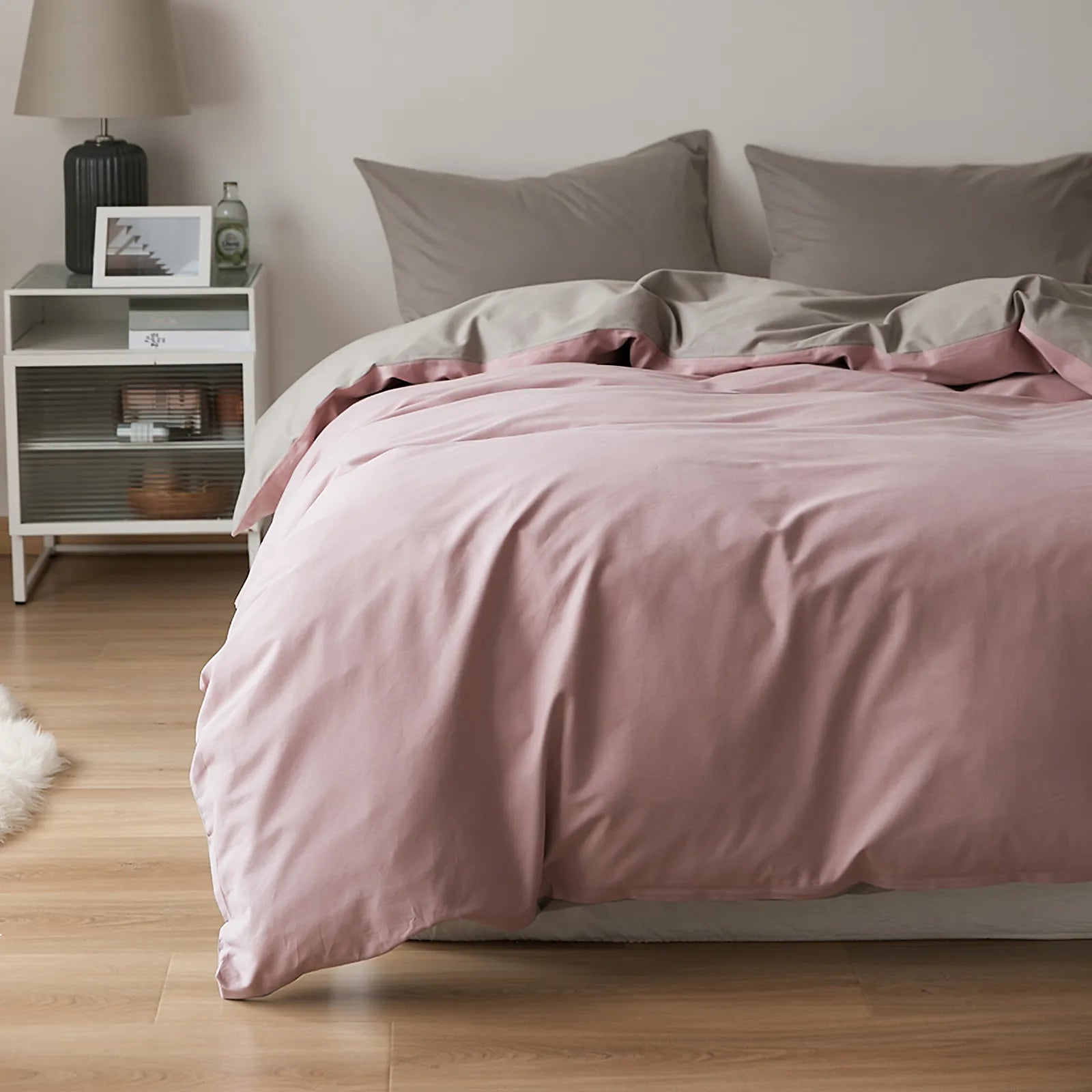 Soft neutral two-tone washed cotton duvet cover with a minimalist solid design on a cozy modern bed – RoomDen