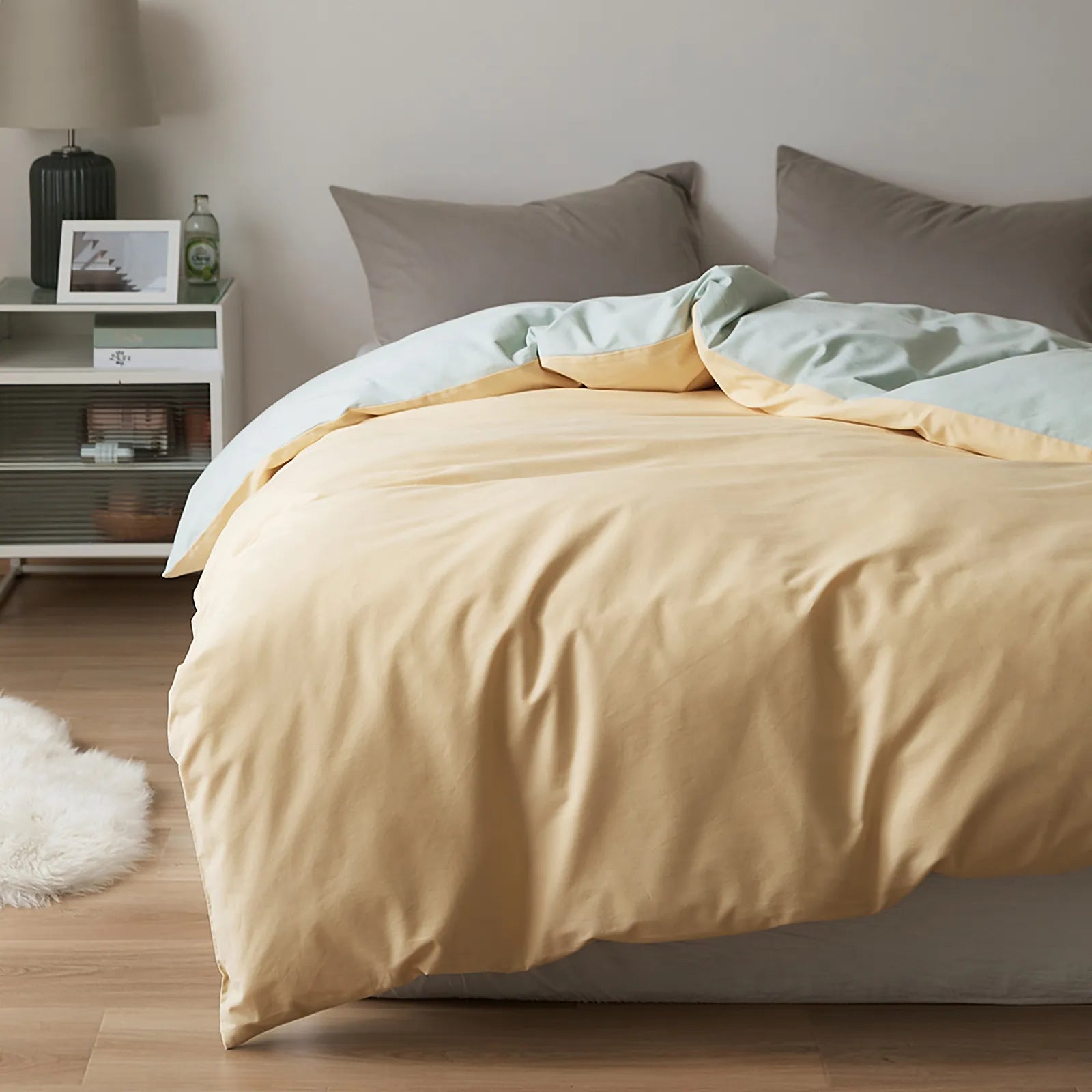 Soft neutral two-tone washed cotton duvet cover with a minimalist solid design on a cozy modern bed – RoomDen