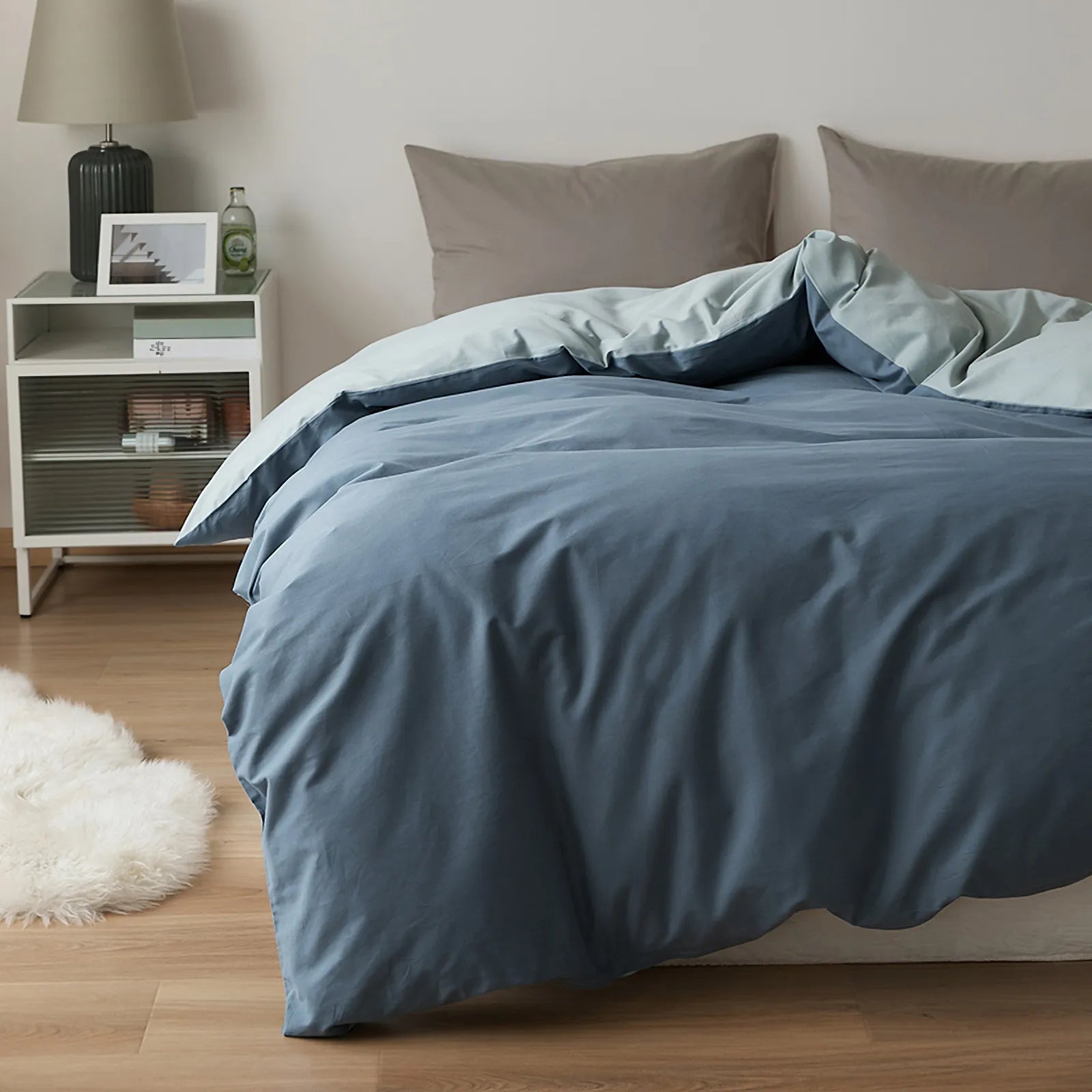 Soft neutral two-tone washed cotton duvet cover with a minimalist solid design on a cozy modern bed – RoomDen