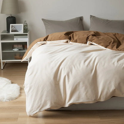 Soft neutral two-tone washed cotton duvet cover with a minimalist solid design on a cozy modern bed – RoomDen