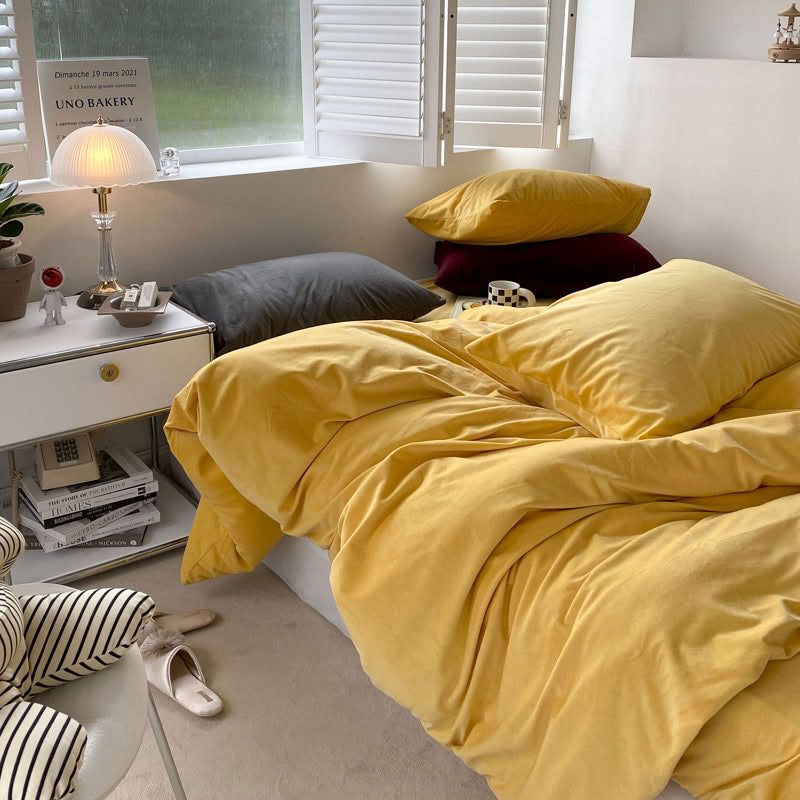 Solid Yellow velvet bedding set with soft plush texture and minimalist cozy bedroom scene - RoomDen