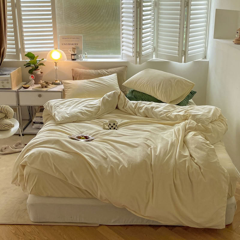 Solid Cream Ivory velvet bedding set with soft plush texture and minimalist cozy bedroom scene - RoomDen