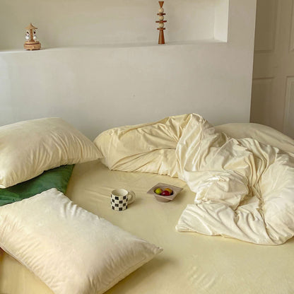 Solid Cream Ivory velvet bedding set with soft plush texture and minimalist cozy bedroom scene - RoomDen