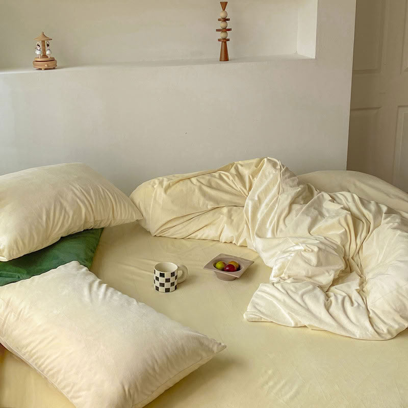 Solid Cream Ivory velvet bedding set with soft plush texture and minimalist cozy bedroom scene - RoomDen