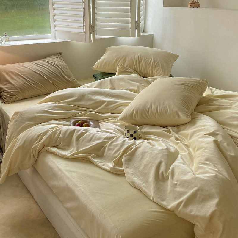 Solid Cream Ivory velvet bedding set with soft plush texture and minimalist cozy bedroom scene - RoomDen