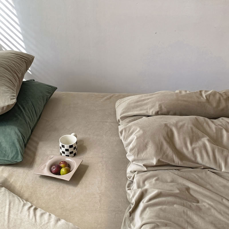 Solid Taupe velvet bedding set with soft plush texture and minimalist cozy bedroom scene - RoomDen