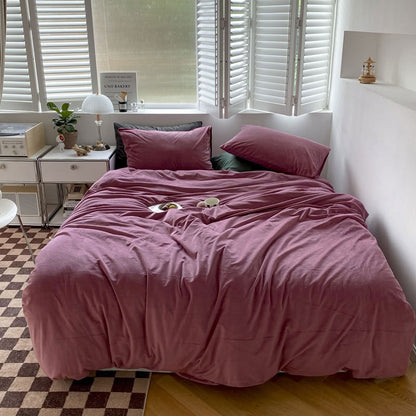 Solid Mauve Pink velvet bedding set with soft plush texture and minimalist cozy bedroom scene - RoomDen
