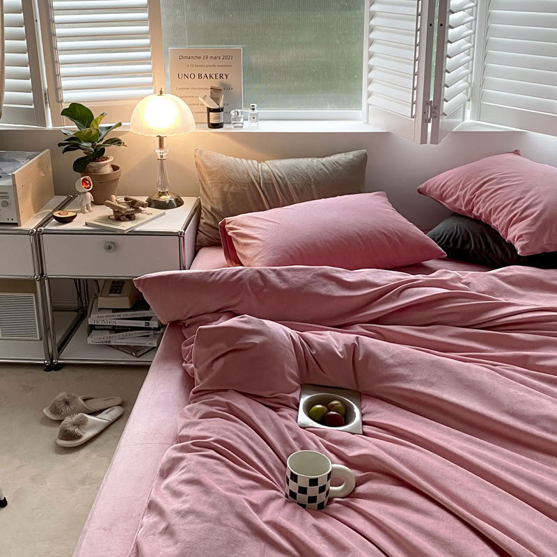 Solid Rose Pink velvet bedding set with soft plush texture and minimalist cozy bedroom scene - RoomDen