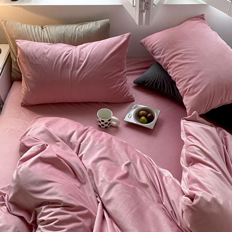 Solid Rose Pink velvet bedding set with soft plush texture and minimalist cozy bedroom scene - RoomDen