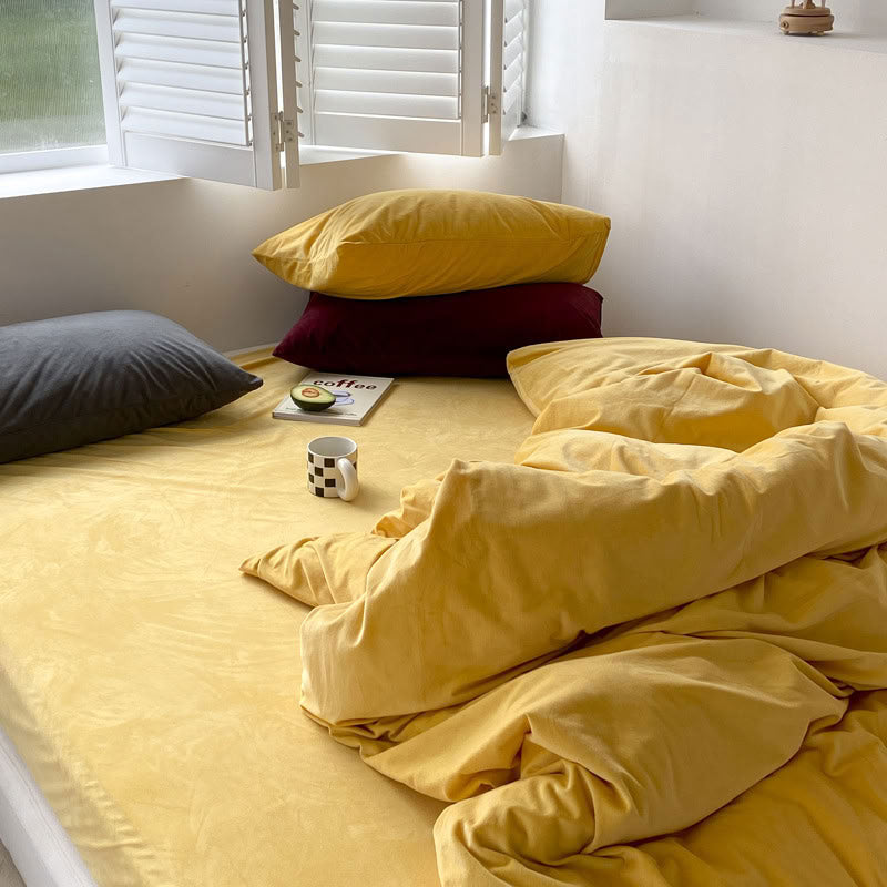 Solid Yellow velvet bedding set with soft plush texture and minimalist cozy bedroom scene - RoomDen