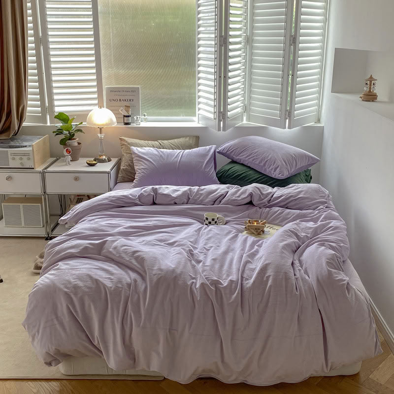 Solid Light Purple velvet bedding set with soft plush texture and minimalist cozy bedroom scene - RoomDen