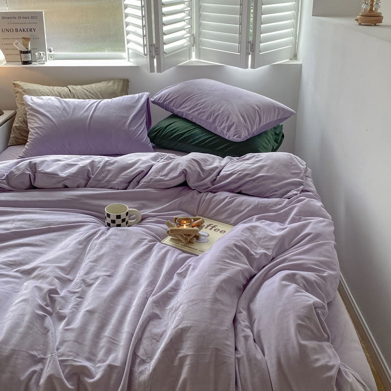 Solid Light Purple velvet bedding set with soft plush texture and minimalist cozy bedroom scene - RoomDen