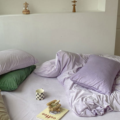 Solid Light Purple velvet bedding set with soft plush texture and minimalist cozy bedroom scene - RoomDen