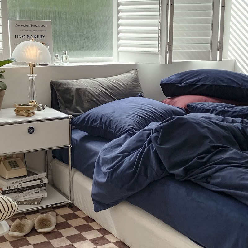 Solid Navy Blue velvet bedding set with soft plush texture and minimalist cozy bedroom scene - RoomDen