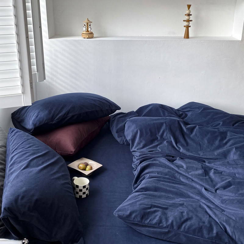 Solid Navy Blue velvet bedding set with soft plush texture and minimalist cozy bedroom scene - RoomDen