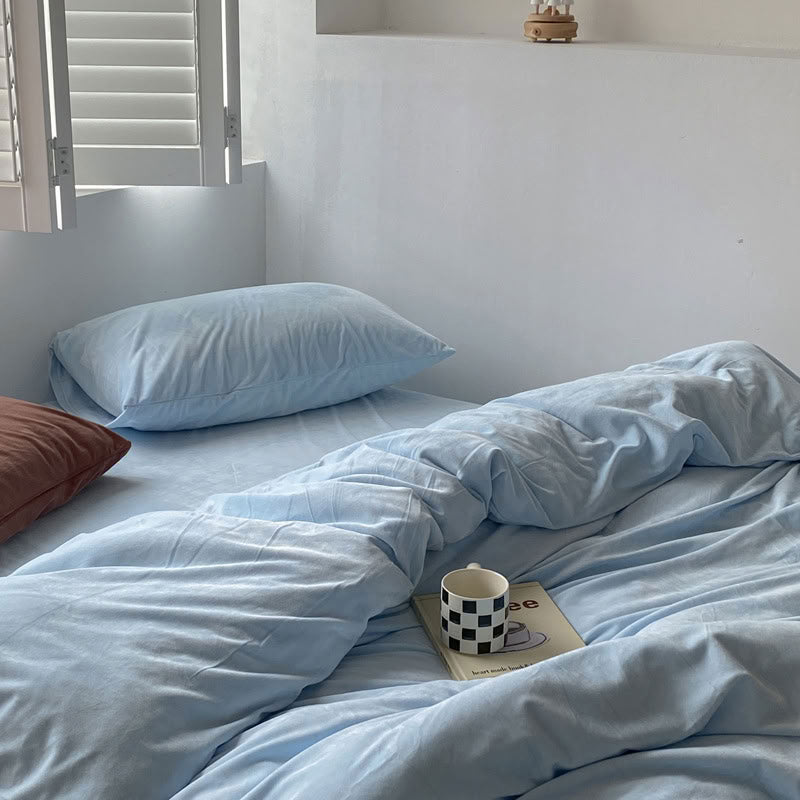 Solid Sky Blue velvet bedding set with soft plush texture and minimalist cozy bedroom scene - RoomDen
