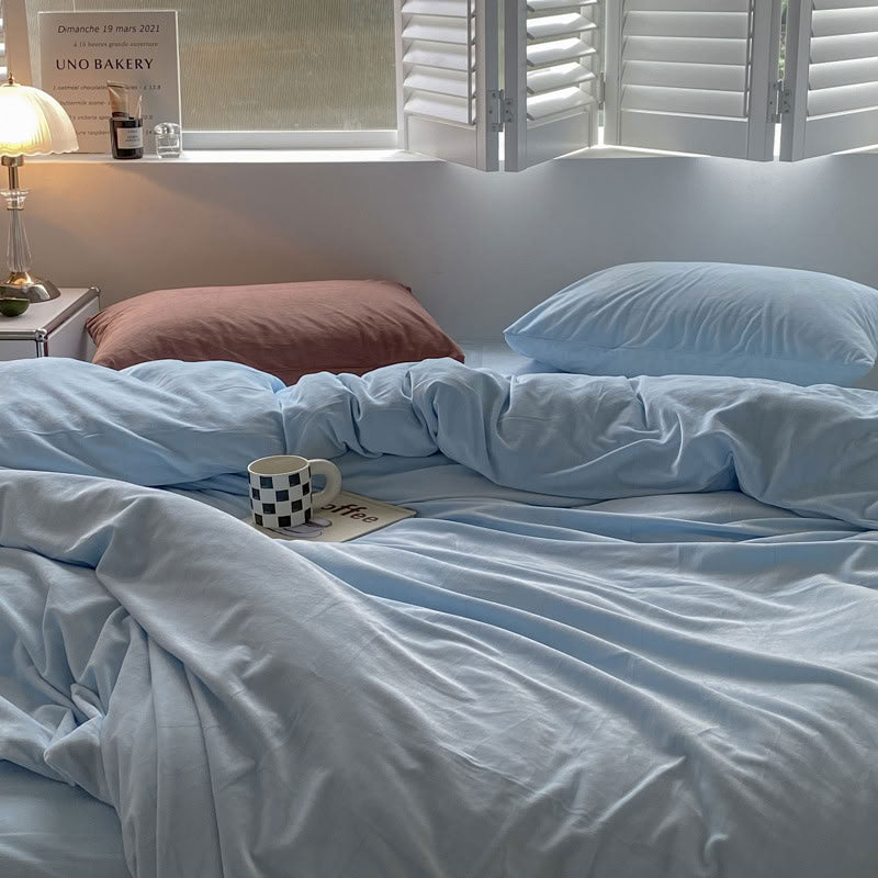 Solid Sky Blue velvet bedding set with soft plush texture and minimalist cozy bedroom scene - RoomDen