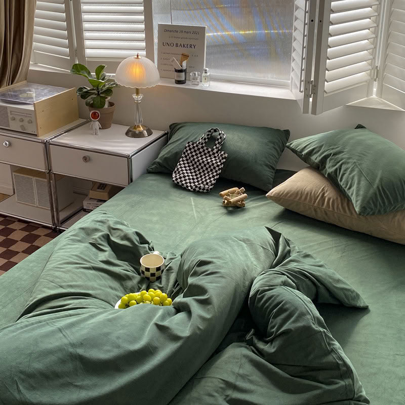 Solid Pistachio Green velvet bedding set with soft plush texture and minimalist cozy bedroom scene - RoomDen