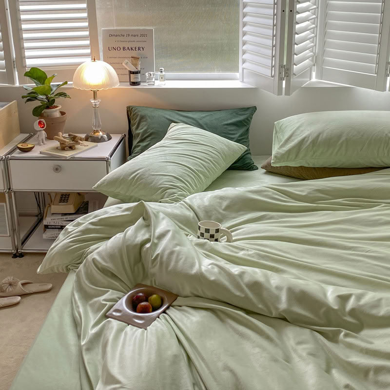 Solid Mint Green velvet bedding set with soft plush texture and minimalist cozy bedroom scene - RoomDen