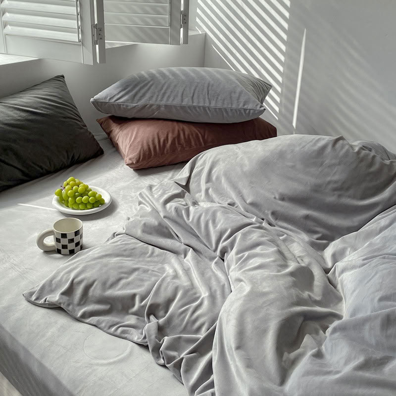 Solid Ivory Grey velvet bedding set with soft plush texture and minimalist cozy bedroom scene - RoomDen