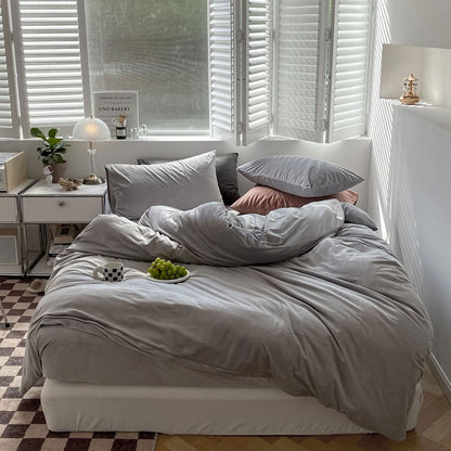 Solid Ivory Grey velvet bedding set with soft plush texture and minimalist cozy bedroom scene - RoomDen