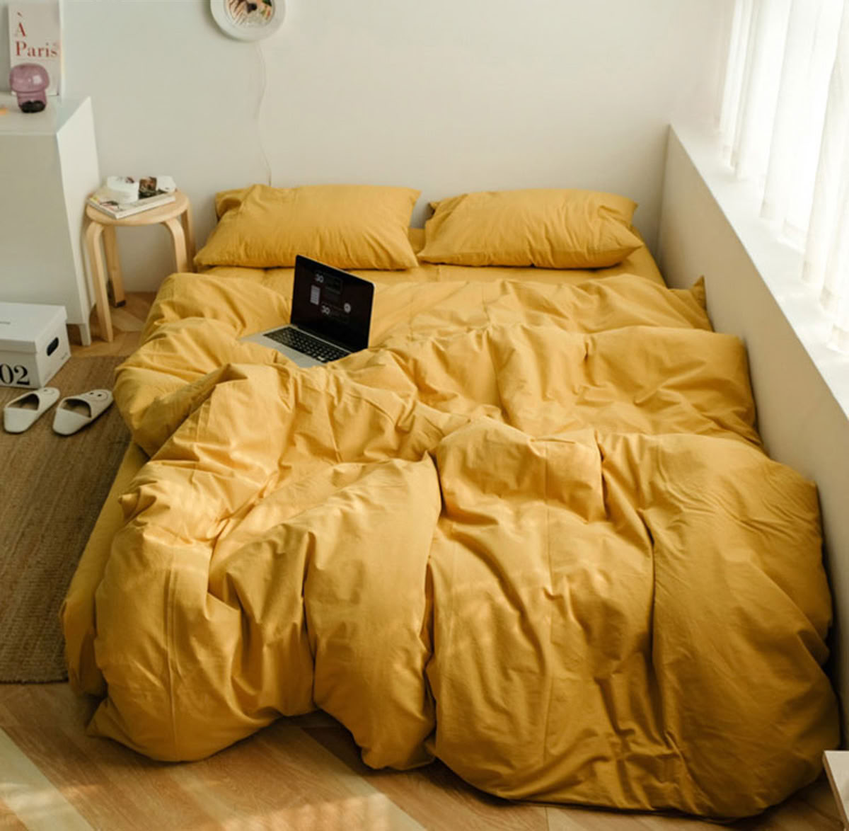 Cheerful sunny yellow washed cotton bedding set, creating a warm and lively atmosphere - RoomDen