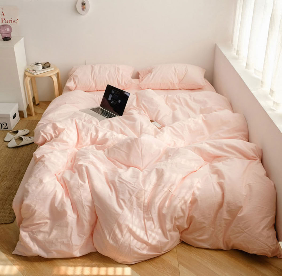 Gentle rose pink washed cotton bedding set creating a warm and romantic atmosphere - RoomDen